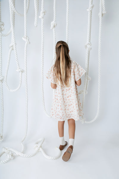 Printed eyelet peach square neck dress by Noma