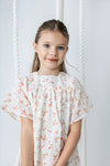 Printed eyelet peach square neck dress by Noma