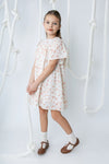 Printed eyelet peach square neck dress by Noma