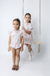 Printed floral peach romper by Noma