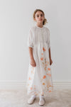 Border floral linen dress by Petite Amalie