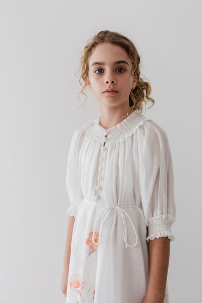 Border floral linen dress by Petite Amalie