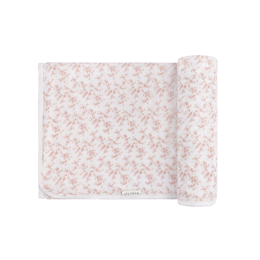 Vine pattern pink on ivory muslin swaddle by Ely's & Co