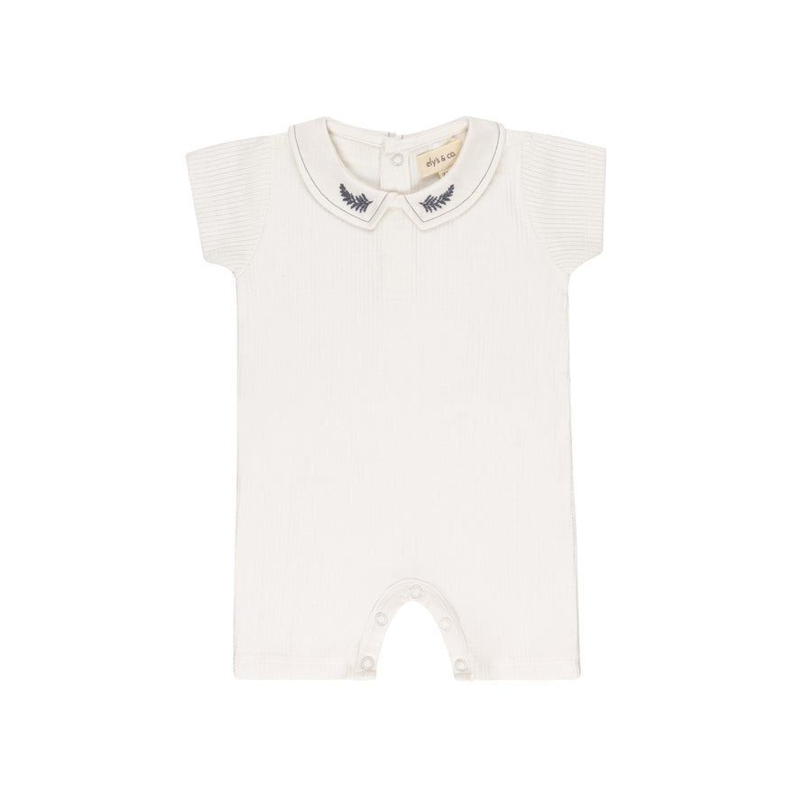 Embroidered collar ivory leaf romper by Ely's & Co