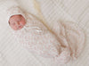 Vine pattern pink on ivory muslin swaddle by Ely's & Co