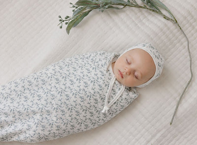 Vine pattern blue on ivory muslin swaddle by Ely's & Co