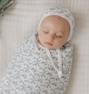 Vine pattern blue on ivory muslin swaddle by Ely's & Co