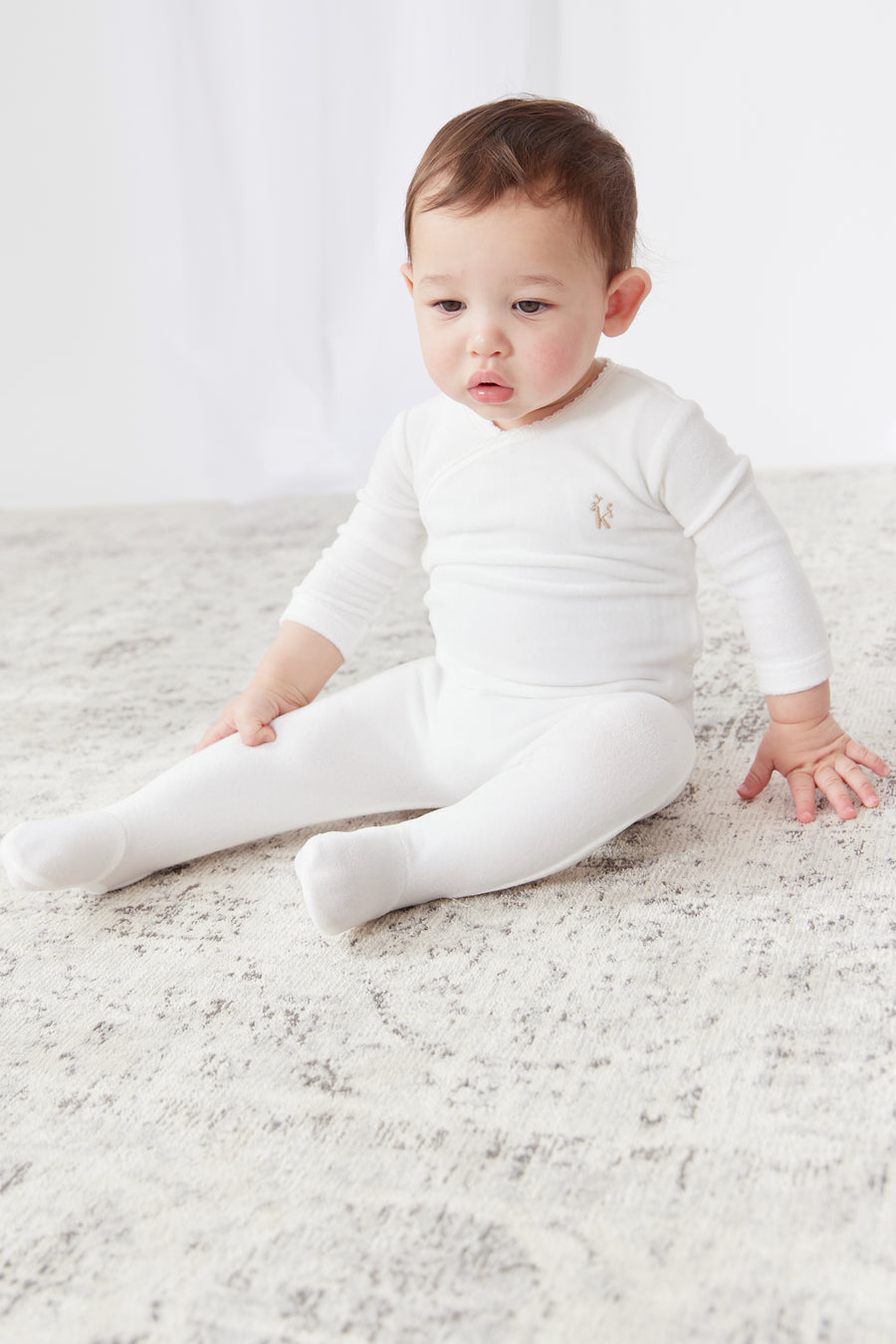 K logo stone footie + bonnet by Kipp Baby