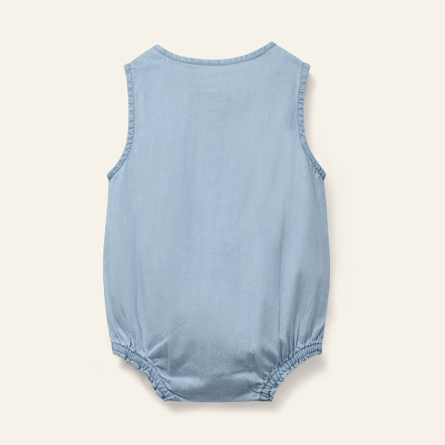 Pale denim romper by Wynken