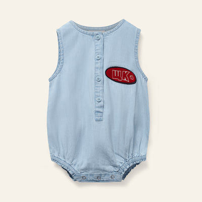 Pale denim romper by Wynken