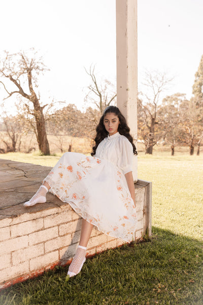 Border floral linen dress by Petite Amalie