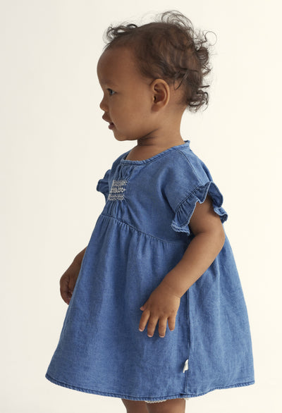 Twill denim baby dress by Cozmo