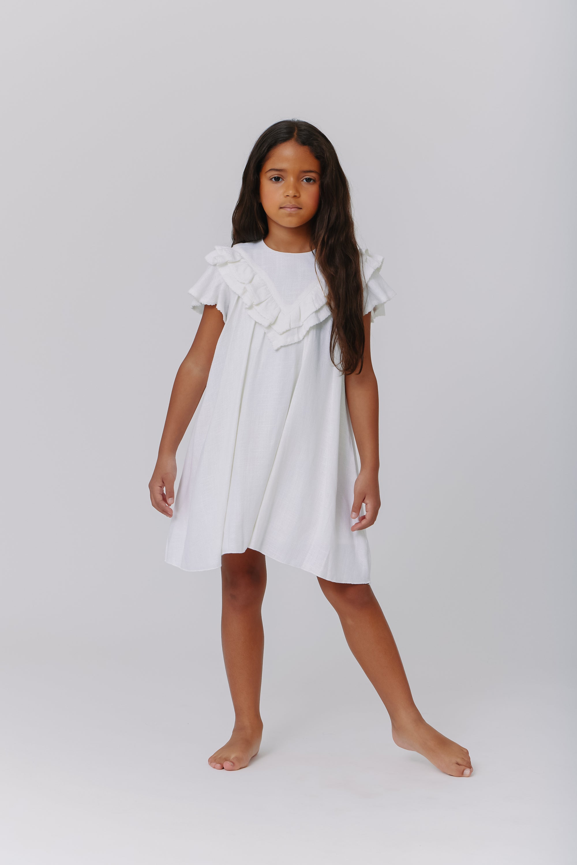 Linen white ruffle dress by Kipp Flying Colors