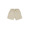 Beige textured shorts by Petit Indi