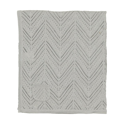 Pale blue knit blanket by Bee & Dee